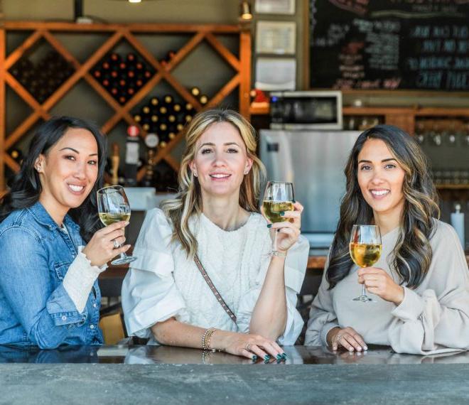 friends enjoying glasses of wine